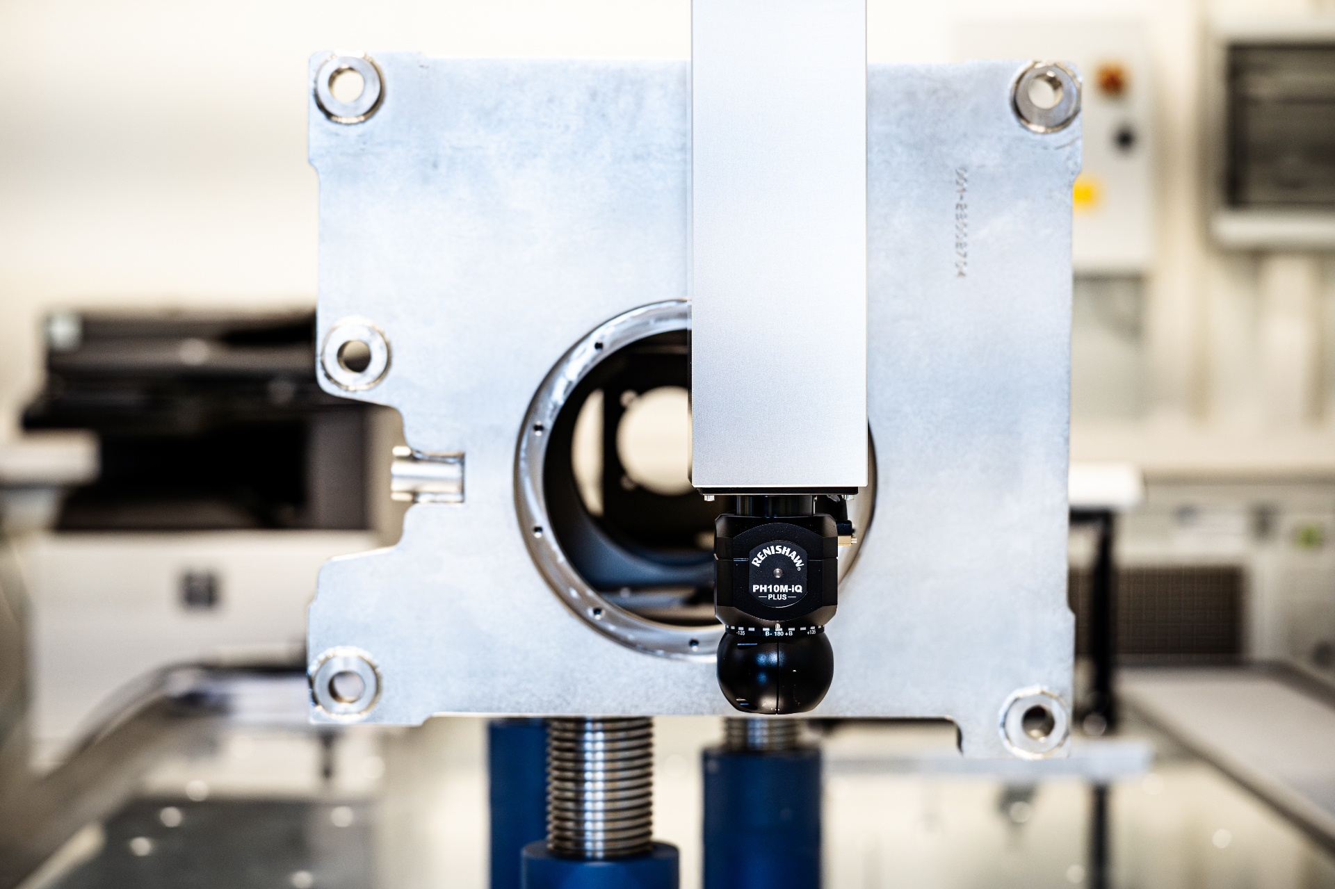 Renishaw probe measuring a machined aluminium housing on the CMM
