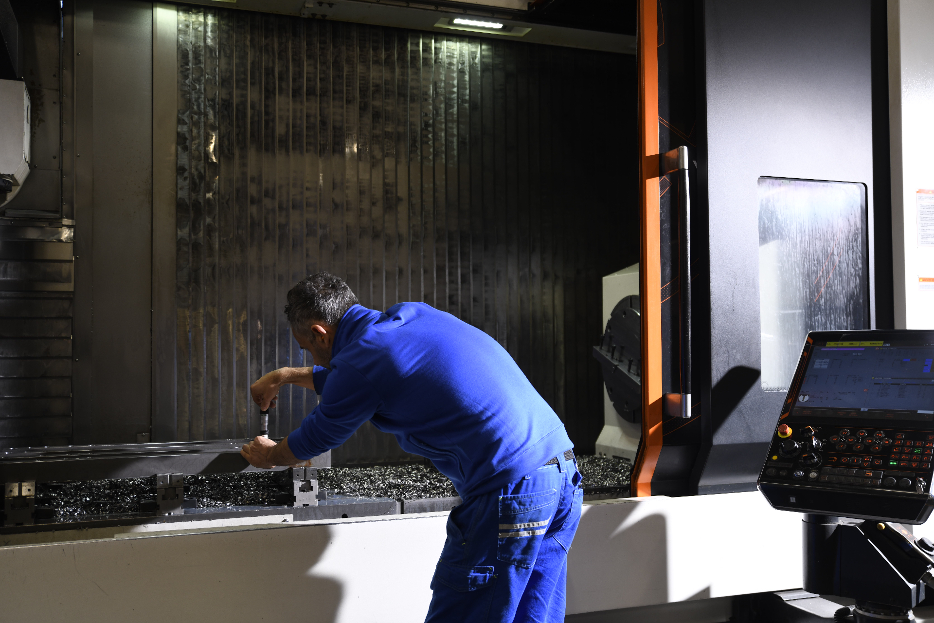 Pellanda technician setting up a CNC milling machine
